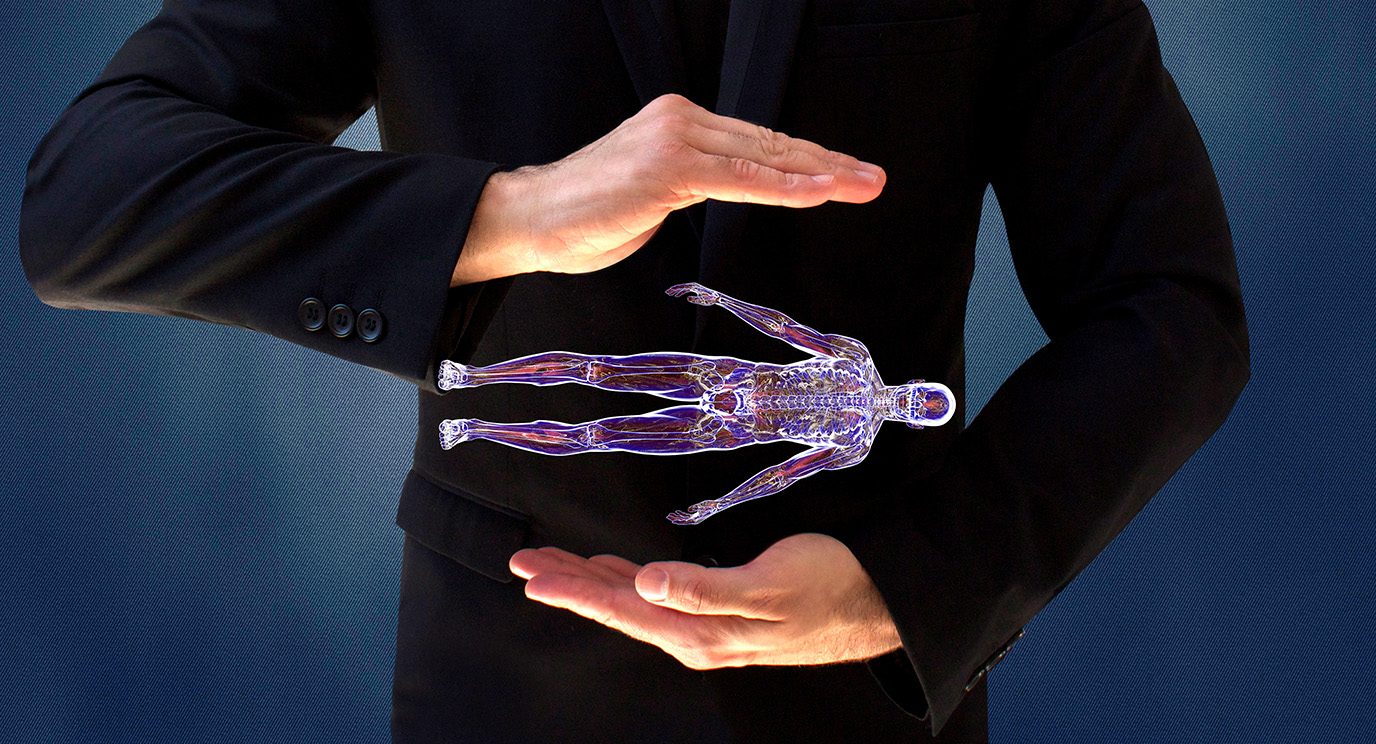 Small-scale holograph of full-body scan image floating between two hands held at waist level