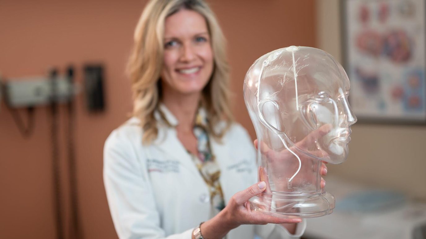 Neuro-oncologist Barbara O'Brien, M.D. demonstrates the placement of an Ommaya reservoir, one of two methods used to deliver intrathecal chemotherapy.