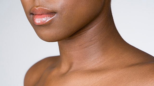 Close up of collar bones of unidentified young, slender Black woman