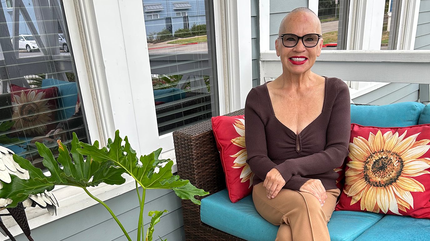 Ovarian cancer survivor Carla Peoples, on the porch of her Galveston home