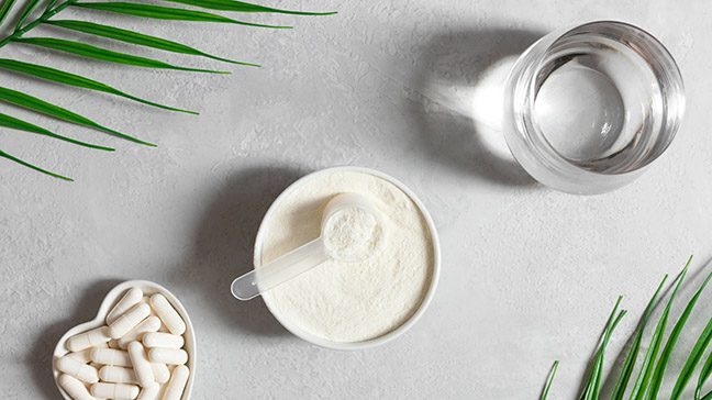 Peptide supplements in capsule and powder form, with a glass of water