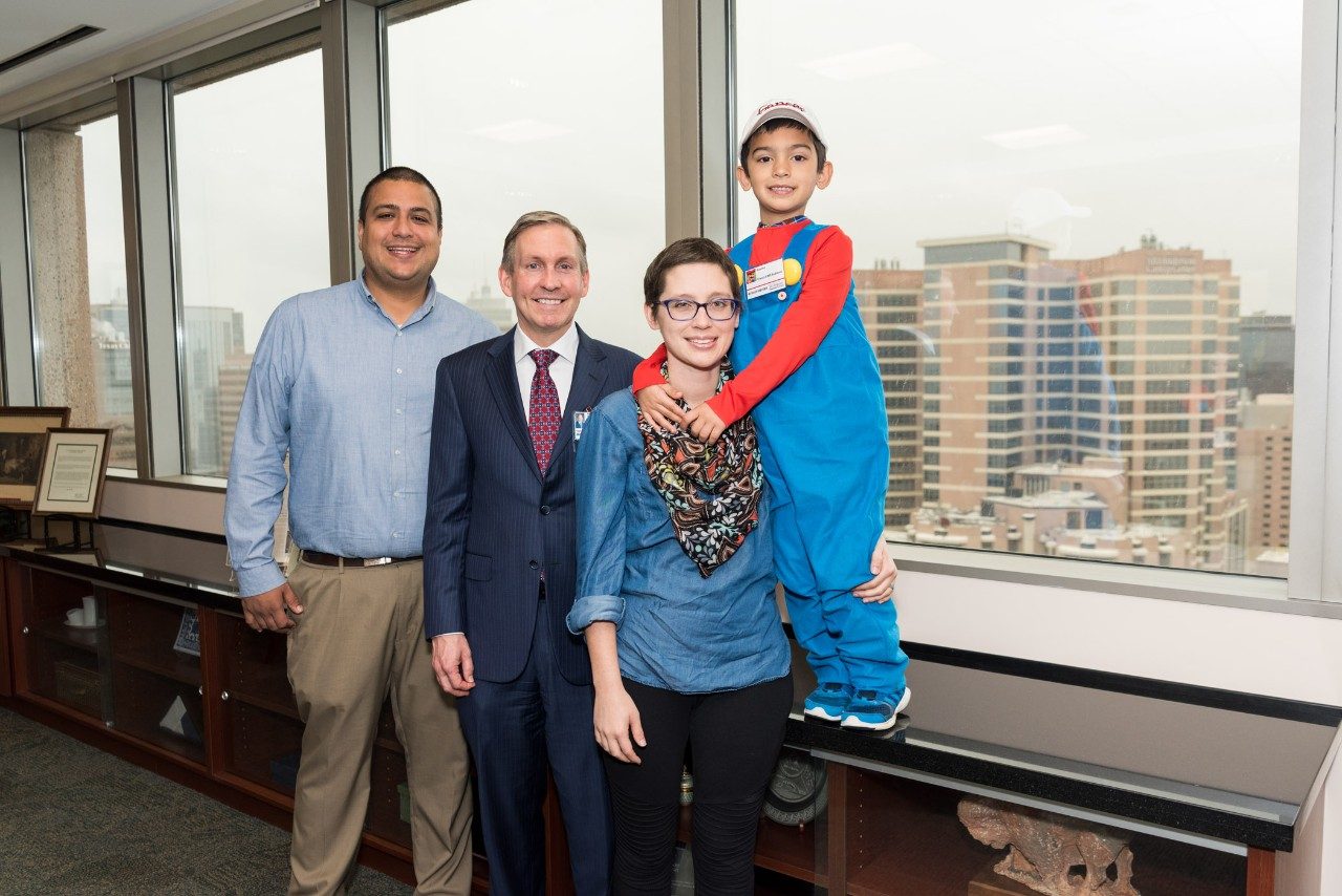 Peter Pisters meets with cancer survivor and her philanthropic 7-year-old son.