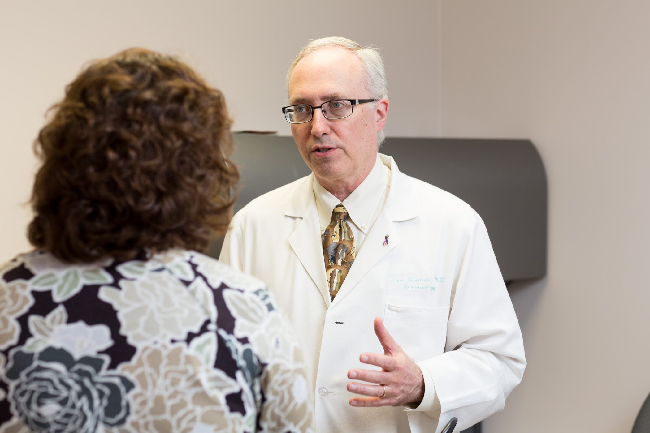 Dr. Sherman meets with patient