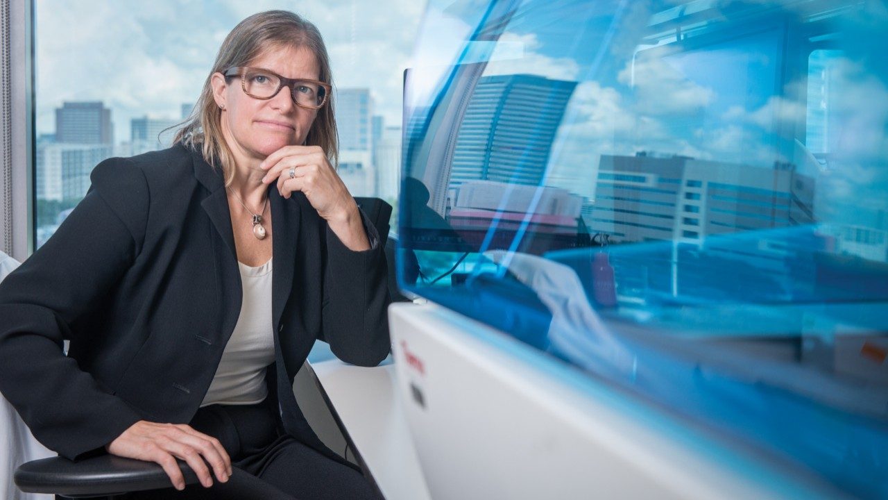 Dr. Jennifer Wargo in the lab, where she researches how the microbriome could play a role in future cancer treatment