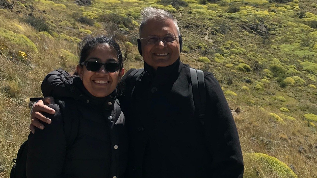 Ekta Gupta, M.D., poses with her father.