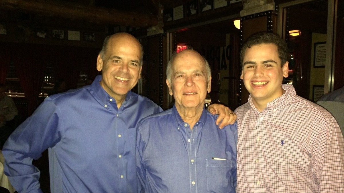 Eduardo Diaz Jr., M.D., poses with his father.