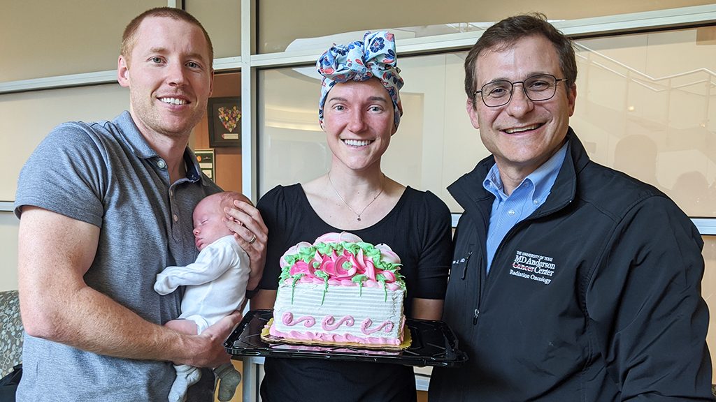 Sinonasal undifferentiated carcinoma survivor Alyssa Warr (middle) with her family and Steven Frank, M.D. (right), after her last proton therapy treatment on March 13, 2020
