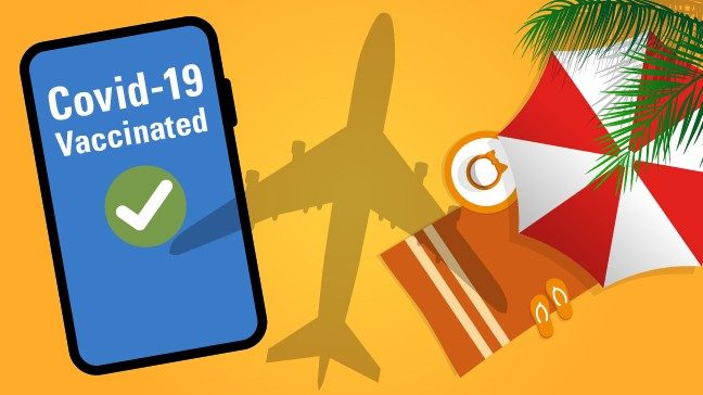 Airplane shadow on beach with towel and umbrella