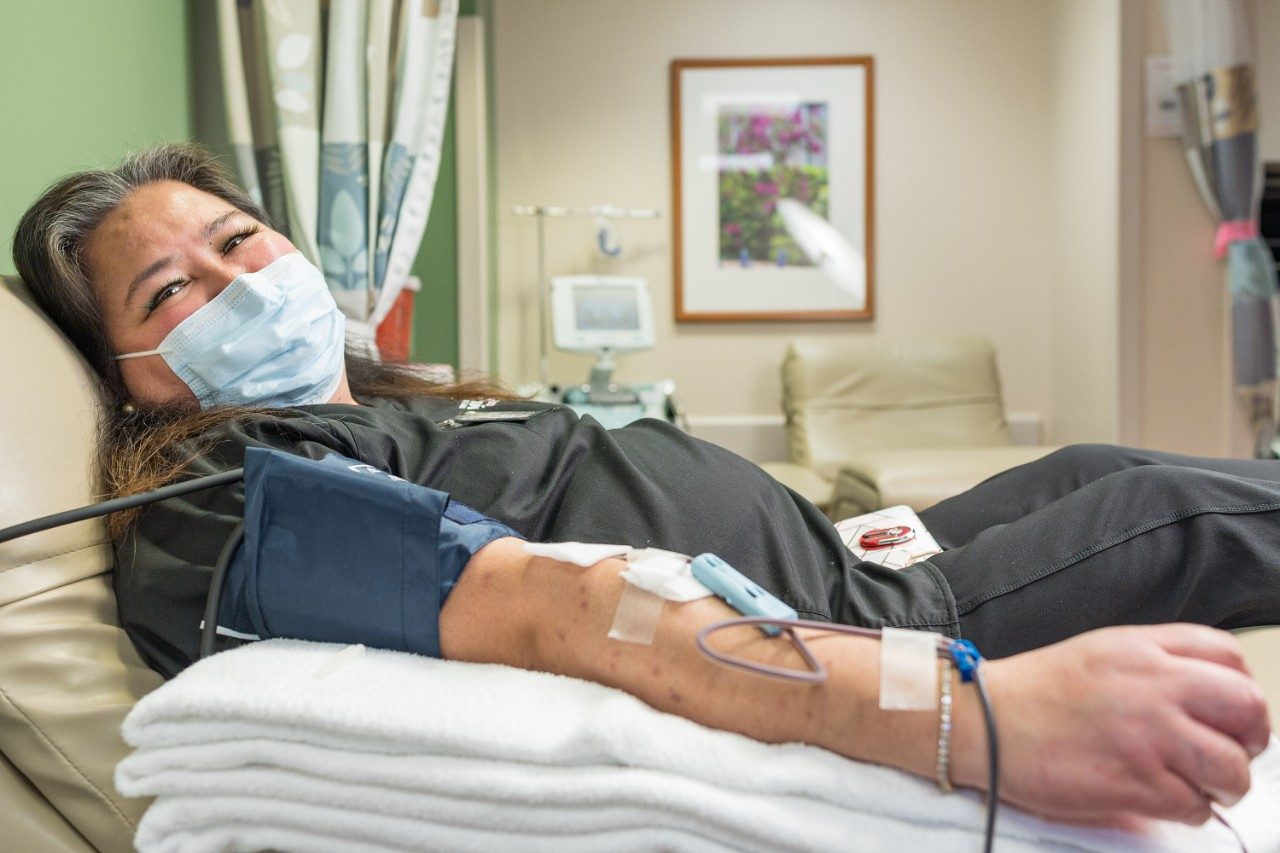 Clinical Nurse Christine Durana donates blood for MD Anderson cancer patients.