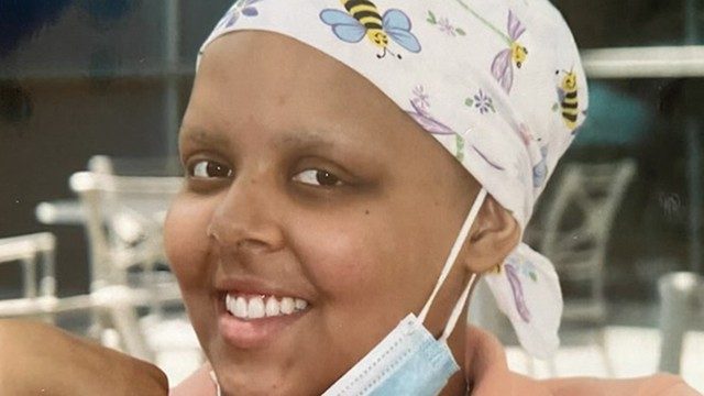 Leukemia survivor Carrington Marzett in her bumblebee hat