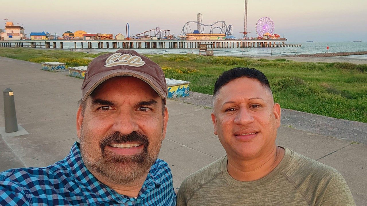 Non Hodgkin lymphoma survivor Donald Logan (left) with his husband, Marlon Leiva Lopez
