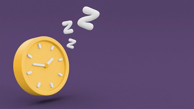 Yellow analog clock surrounded by white Zs against a purple background