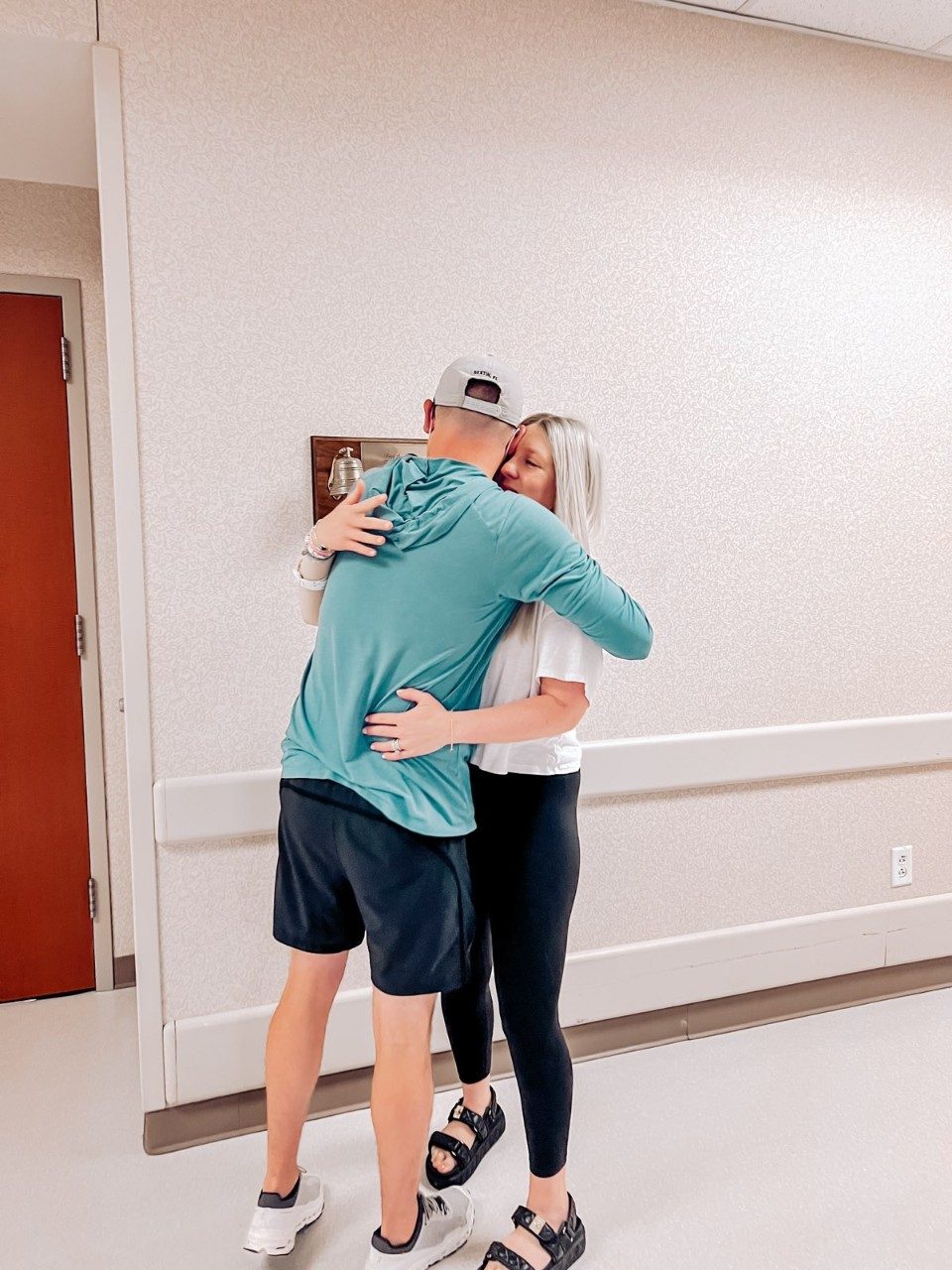 A man and woman embrace