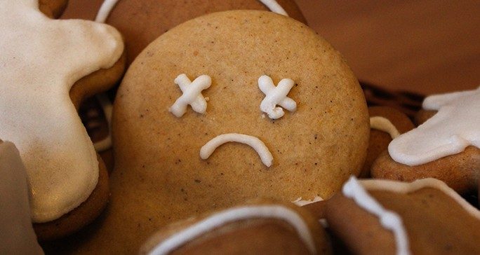 Close-up of gingerbread man with sad face