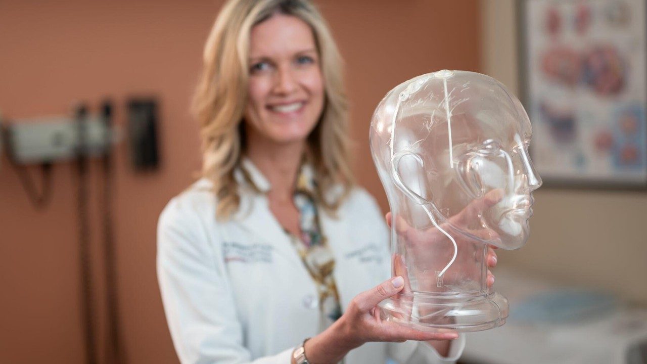 Neuro-oncologist Barbara O'Brien, M.D. demonstrates the placement of an Ommaya reservoir, one of two methods used to deliver intrathecal chemotherapy.