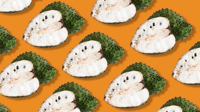 A repeating pattern of green soursop and sliced soursop with white fruit and black seeds against an orange background.
