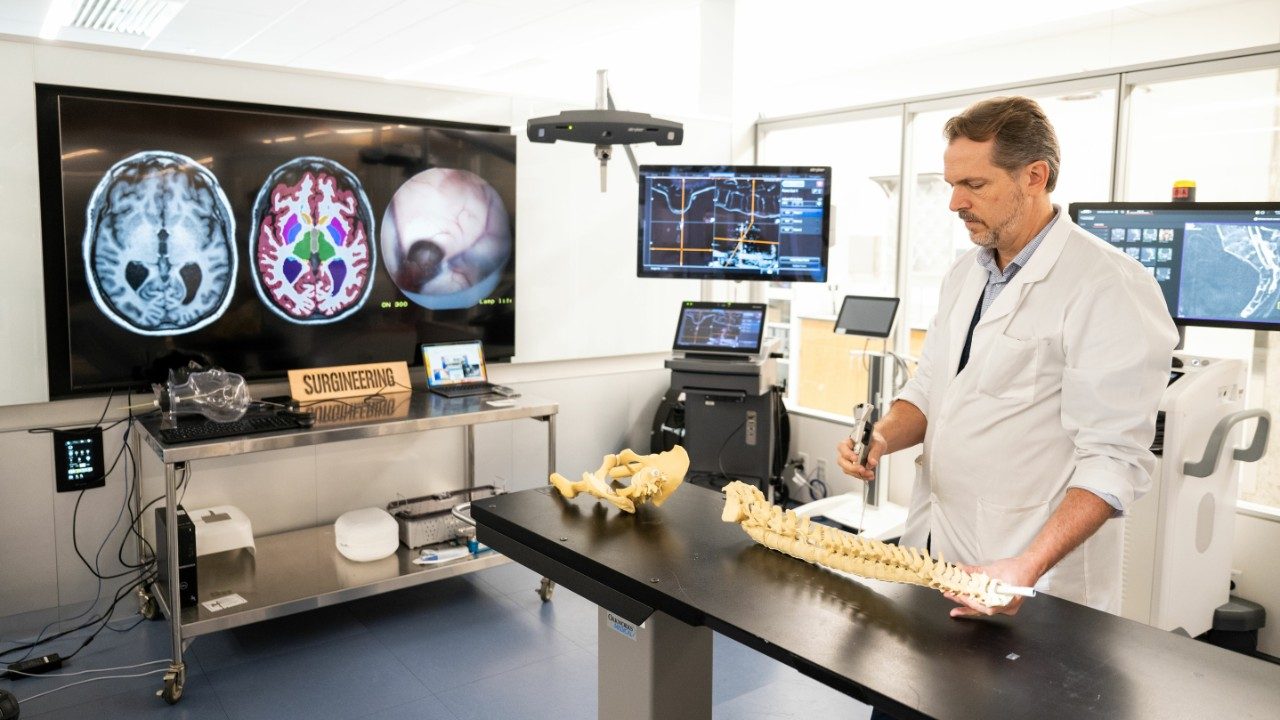 Siewerdsen in the lab with a model of the spine