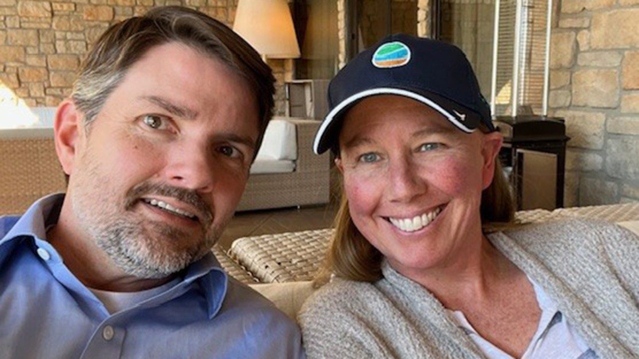 Triple-negative breast cancer survivor April Harless with her husband, Chris