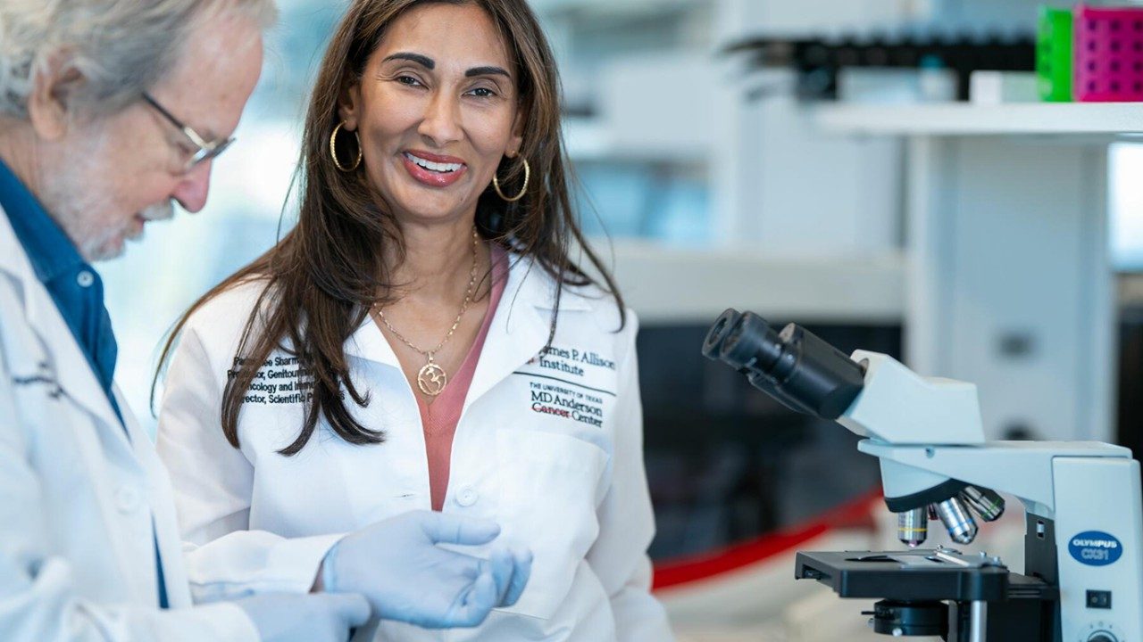 Padmanee Sharma, M.D., Ph.D., and Jim Allison, Ph.D., in the lab at the Allison Institute™.