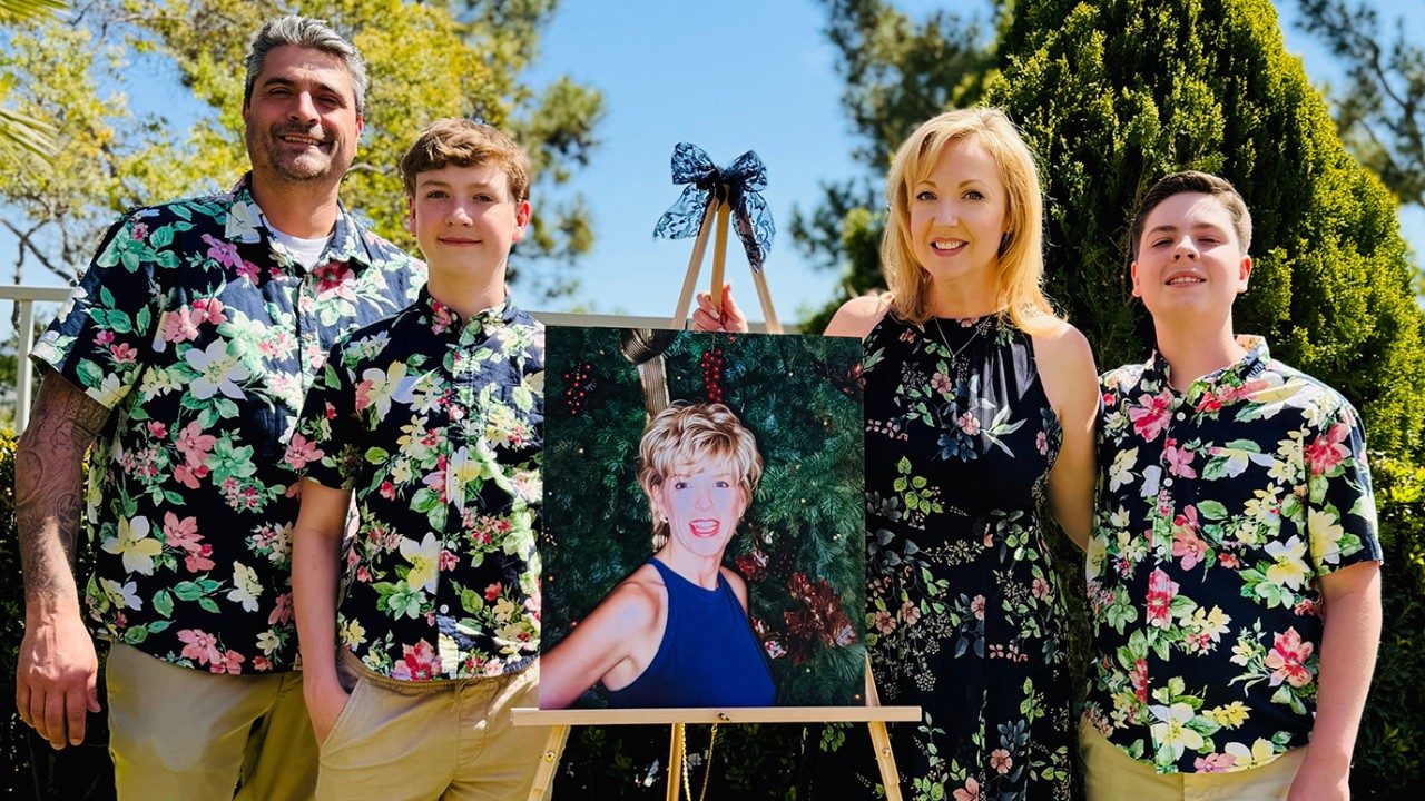 Stomach cancer previvor Ashley Zaldivar with her husband and sons at her mother's funeral in March 2025