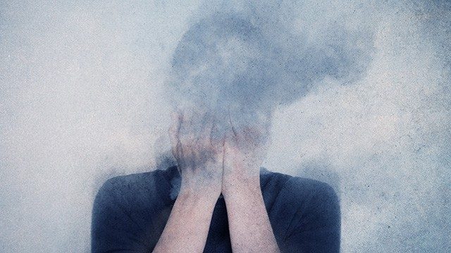 Person with their head in a smoke cloud, is hookah bad for you?