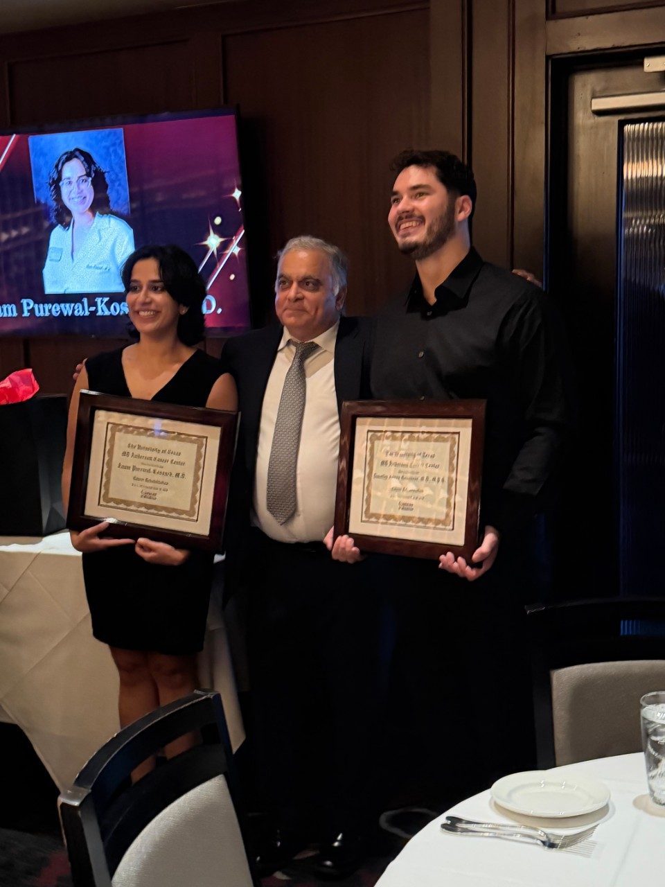 2025 PMR Graduation Timothy Genovese, MD and Anam Purewal-Kossack with Fellowship Director, Rajesh Yadav MD