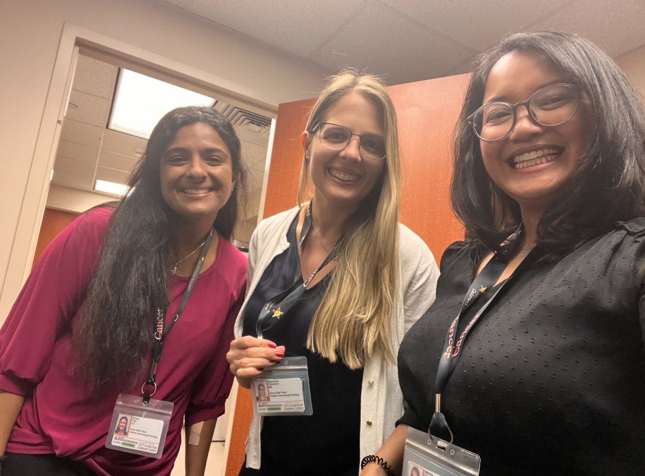 Trio of doctors visiting their boss