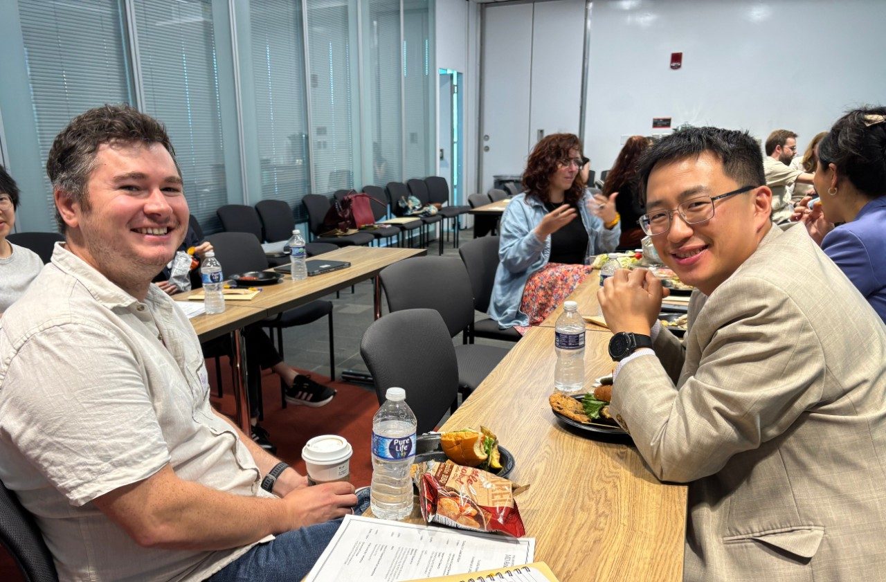 two people pose for a photo