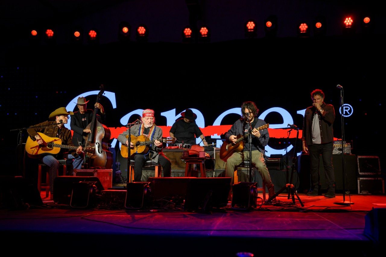 Willie Nelson and his son, Micah Nelson, perform at the public launch event on Nov. 12, 2025.