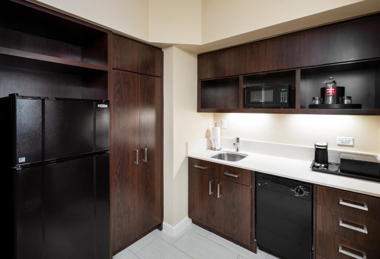 Kitchenette in a suite with one queen bed and kitchenette