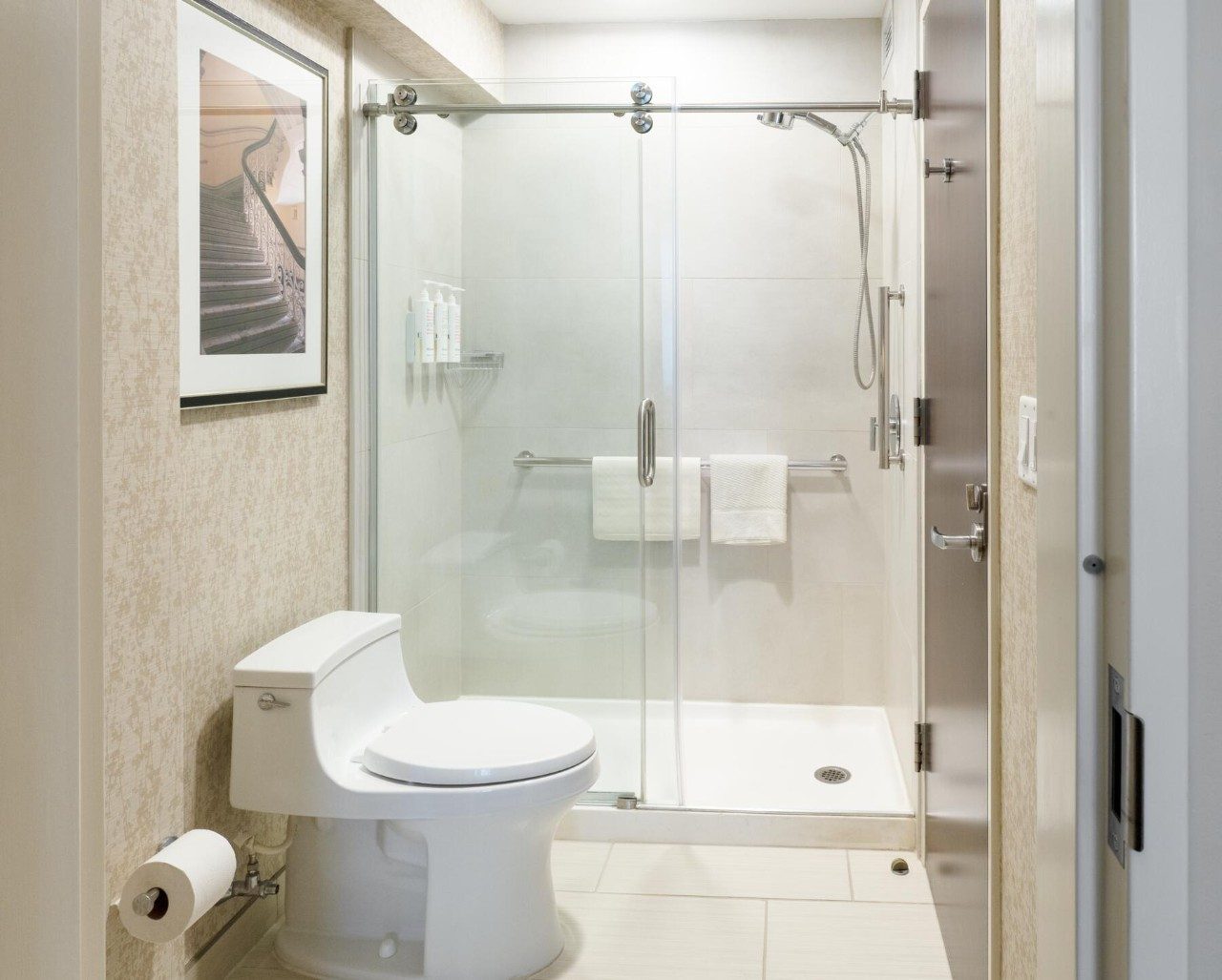 Bathroom in a suite with king bed and kitchenette