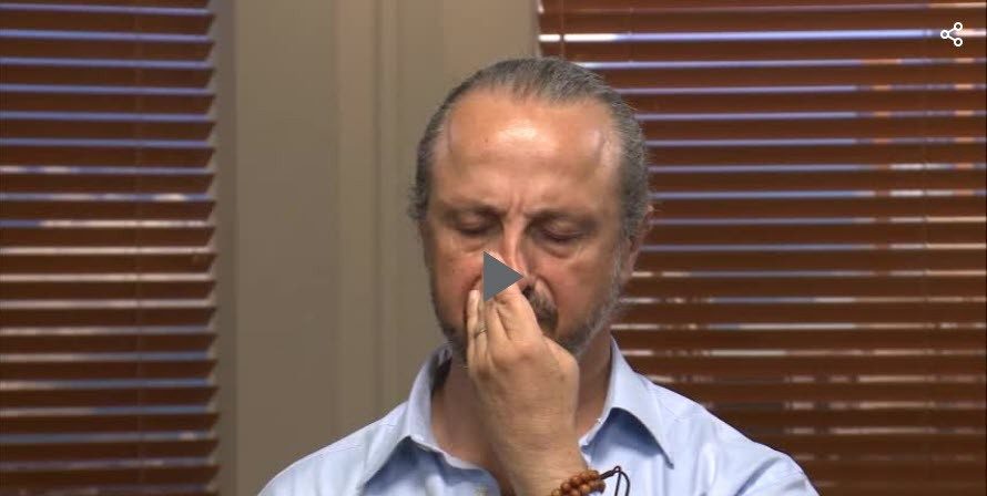 Photo of man doing breathing exercises