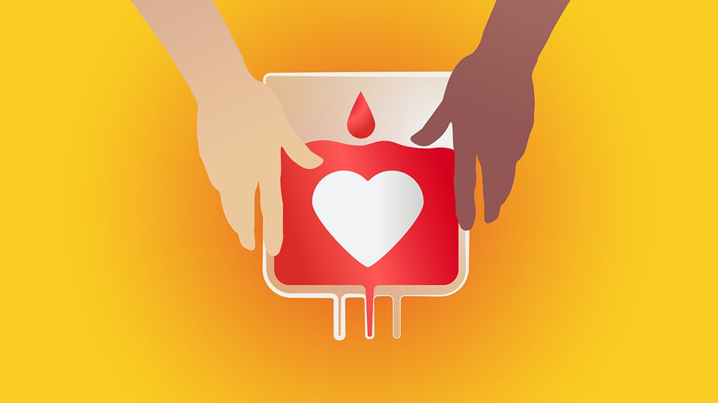 Hands touching a bag of donated blood