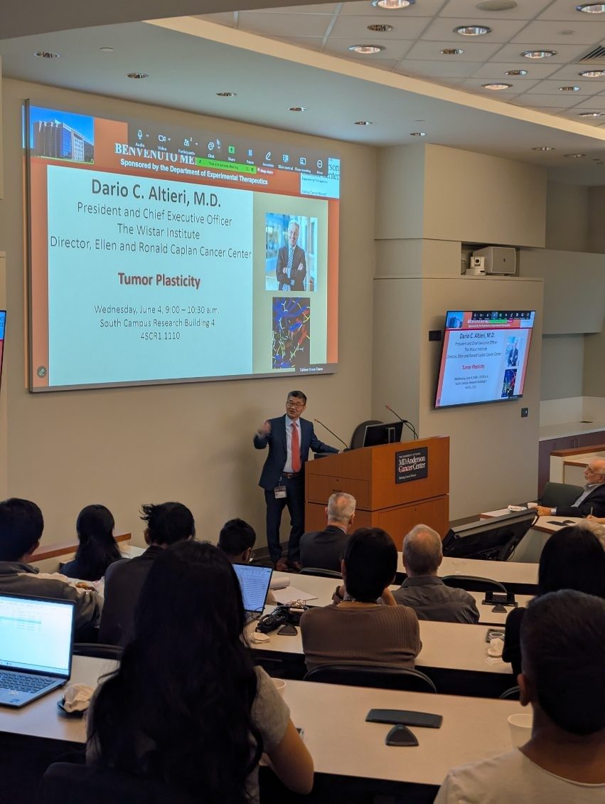 Rugang Zhang at podium