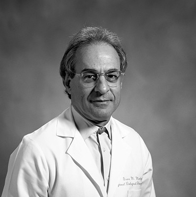 Dr. Mavligit smiling at camera