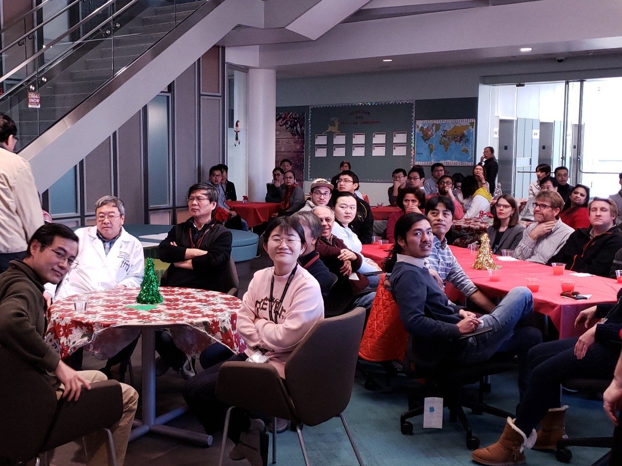 Large group of people around tables