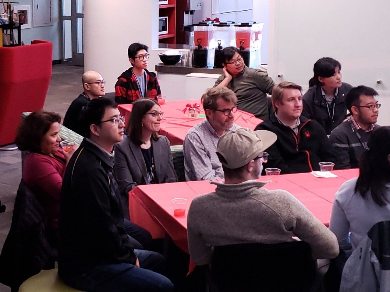 Large group of people around tables