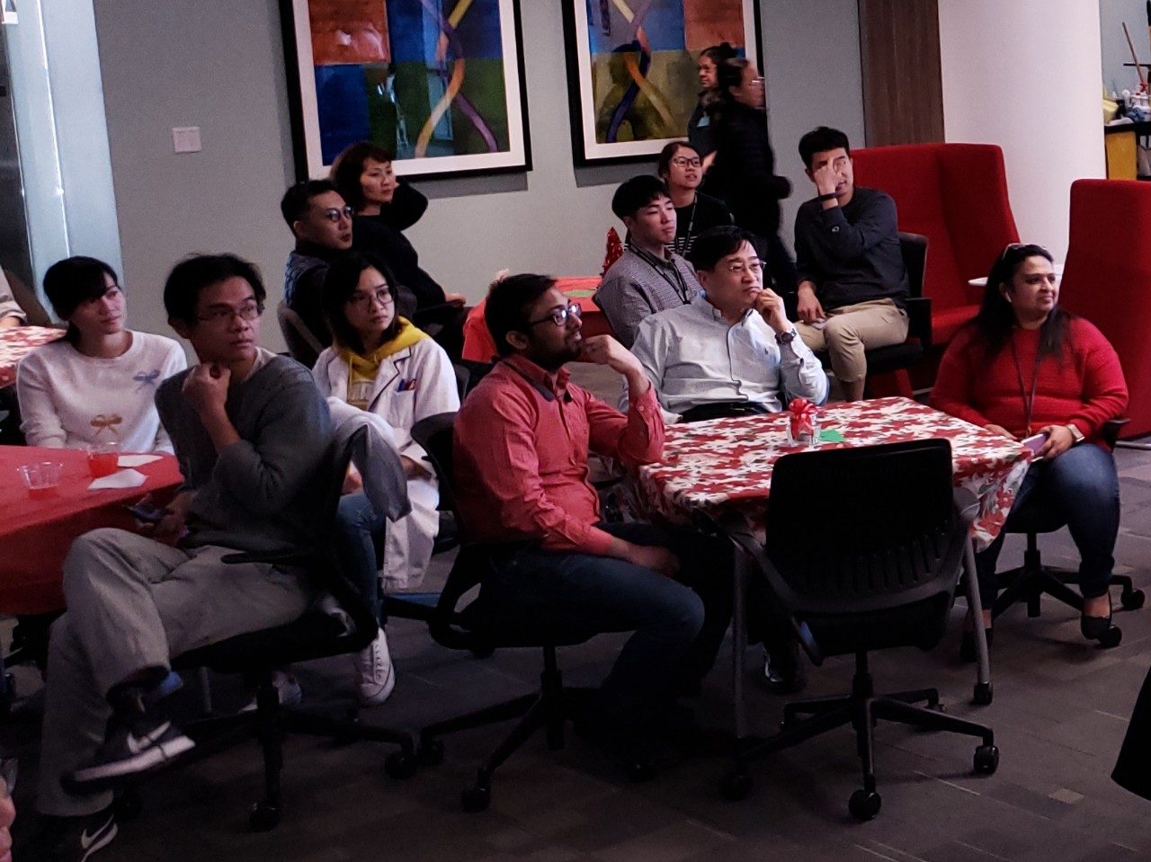 Large group of people around tables