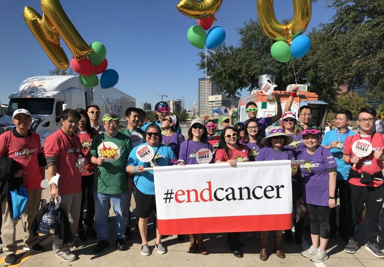 Large group of people with an EndCancer banner