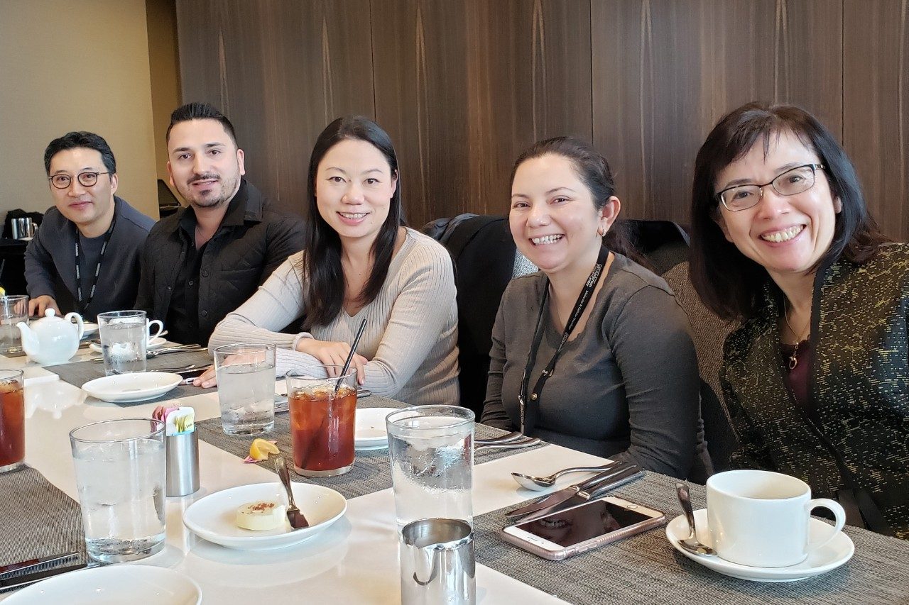 Five people at a table
