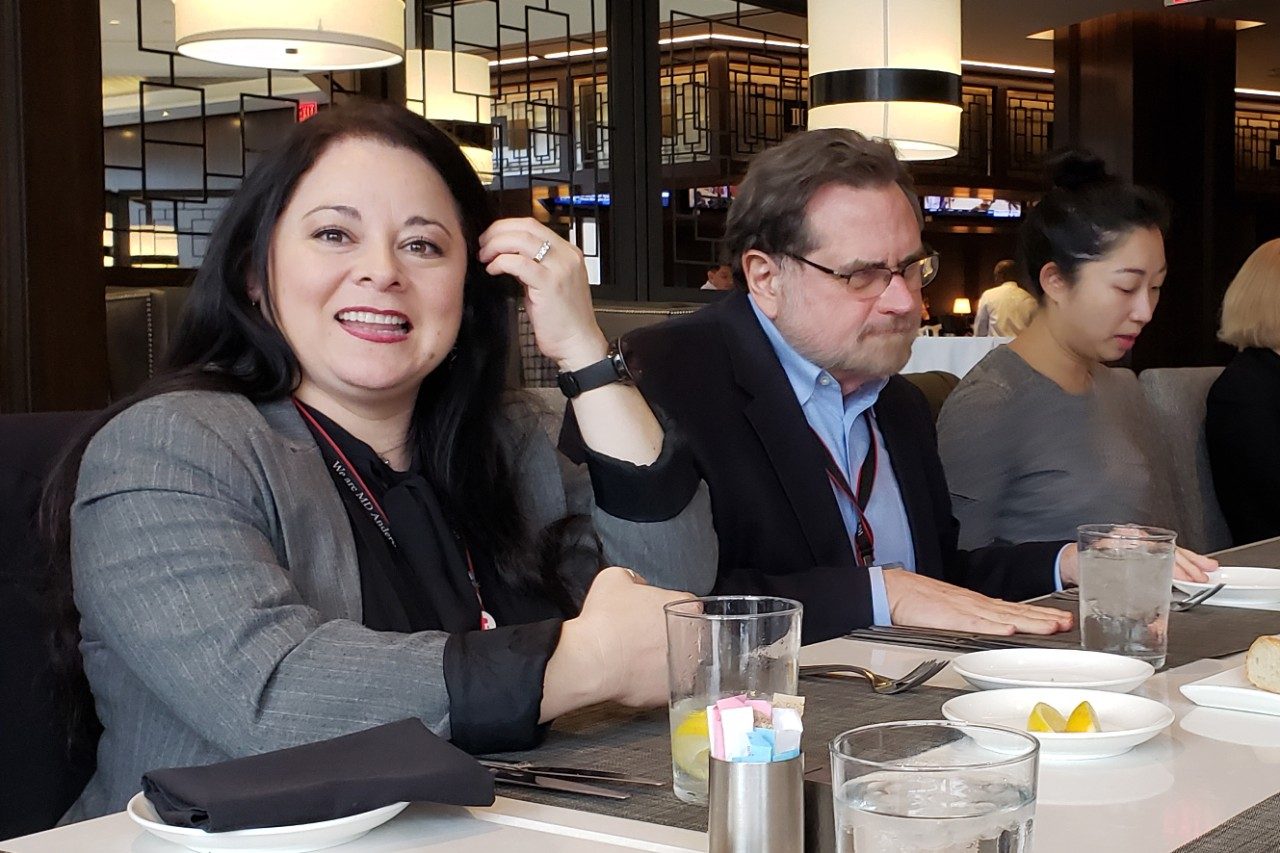 Three people at a table