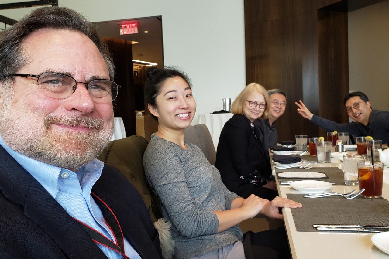 Five people at a table