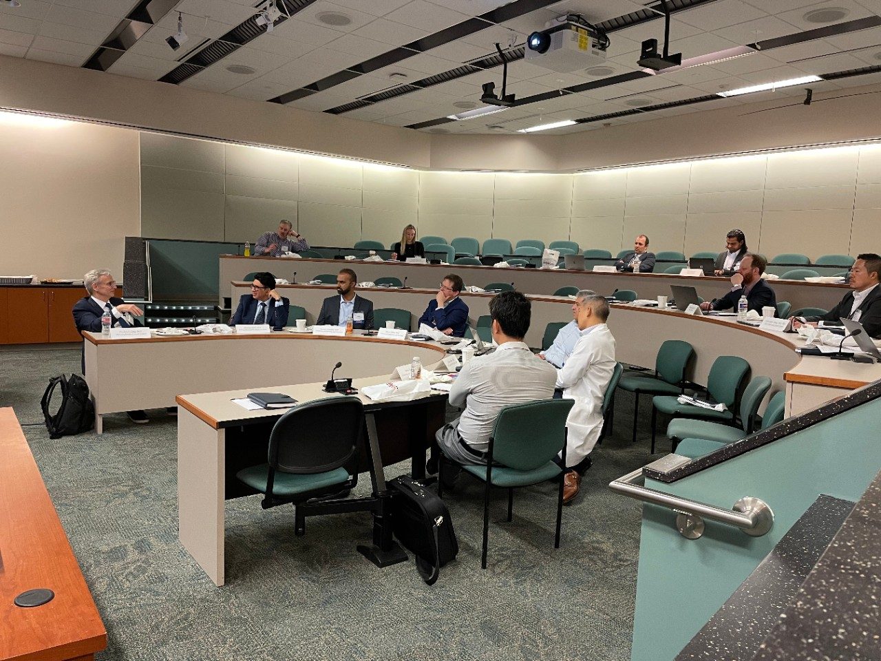 Group of doctors meeting in a conference room at MD Anderson