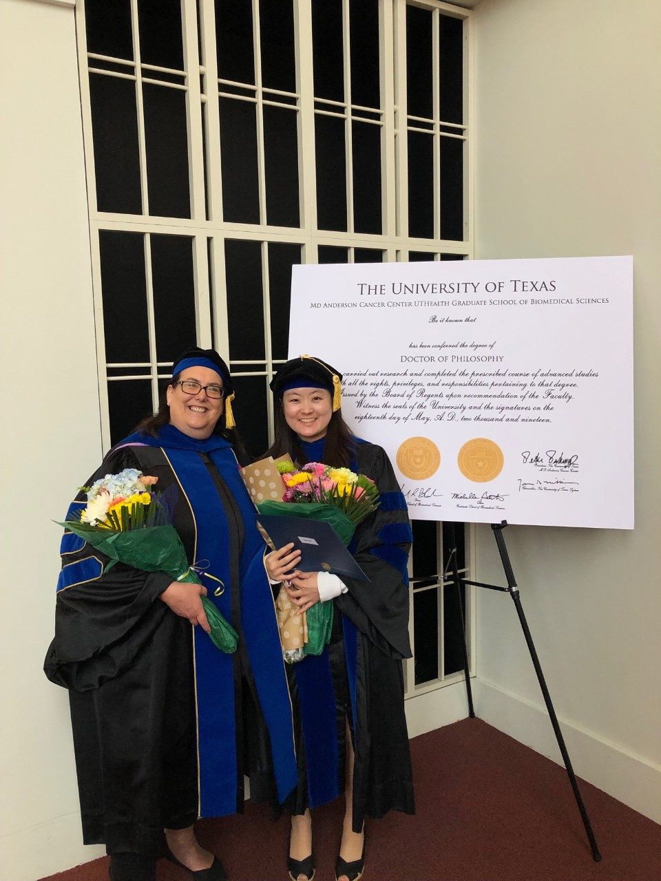 Dr. Cole and Dr. Rhea Kang, the first Cole lab Ph.D. graduate