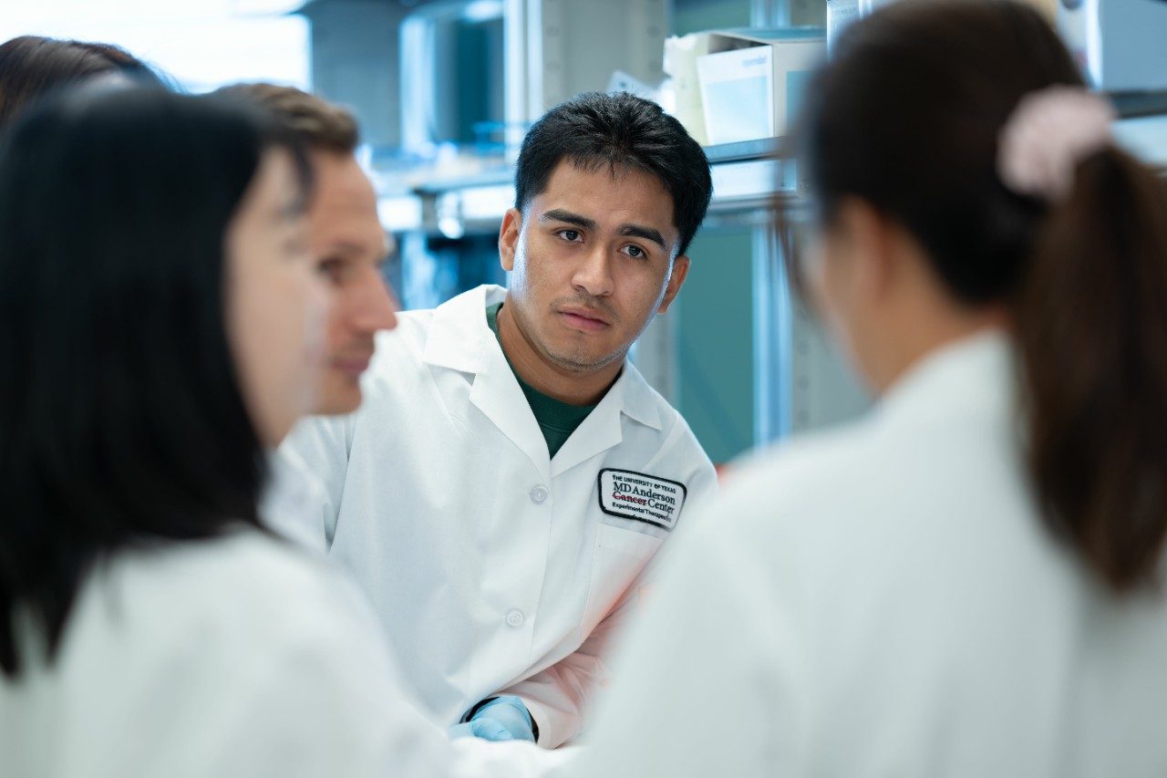 Eschweiler lab group in white coats