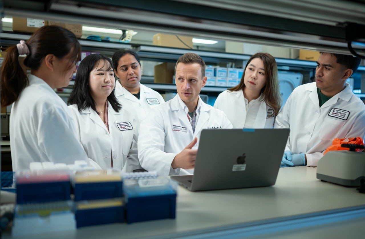 Eschweiler lab group in white coats