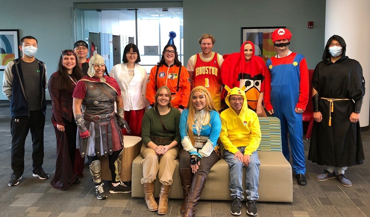 Mazur group members in Halloween costumes, including a Super Mario and a Houston Rockets player