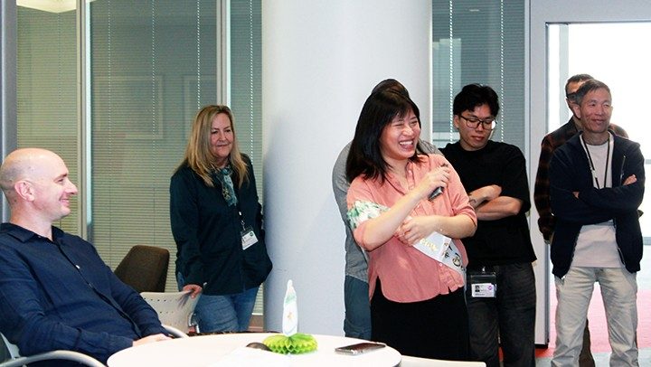 Photo showing members of the Symptom Research department at a baby shower for Yuan Pan