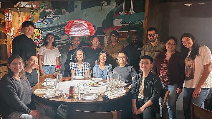 Photo of farewell dinner for Pan Lab members Emilia Lopez and Valeria Vega 