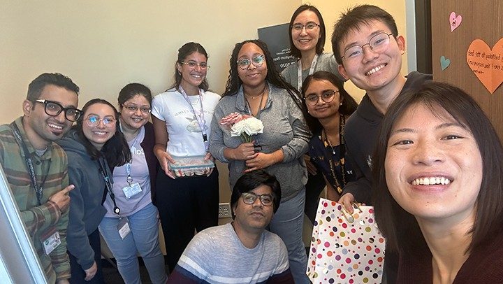 Photo of Pan Lab members at a birthday celebration for Dr. Pan